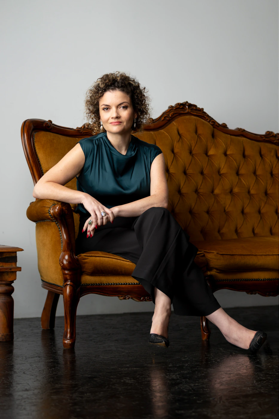 Dr Justine Gatt seated in a chair